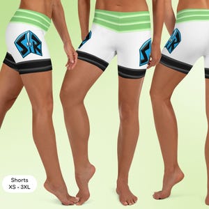 a woman wearing a pair of short shorts