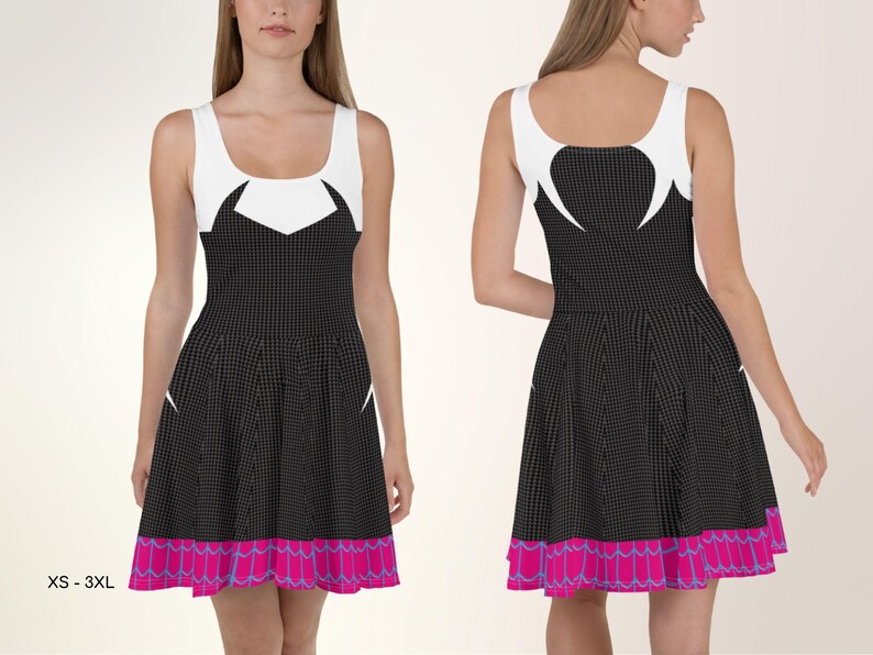 a woman in a black and white dress with pink trim