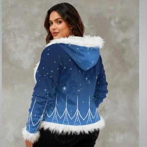 May include: A blue hooded jacket with a starry night design and white detailing. The jacket has a faux fur trim on the hood and cuffs, and a white decorative pattern along the hem. The jacket is a winter-themed garment.
