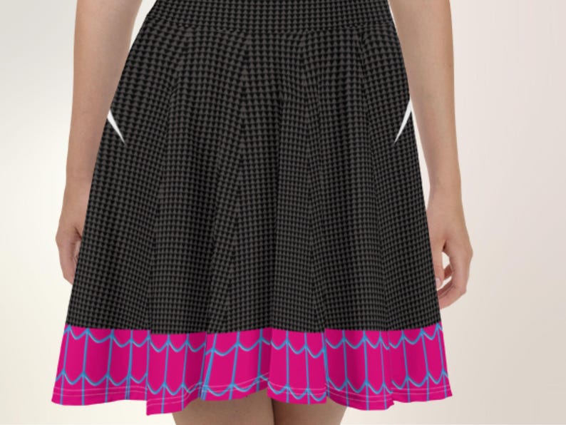 a woman wearing a black and pink skirt