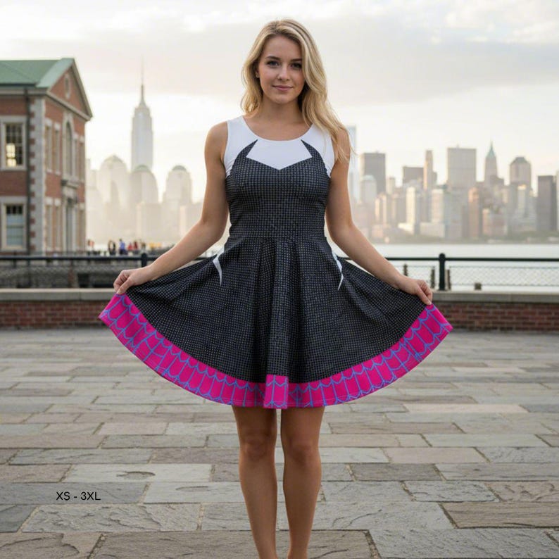 May include: A sleeveless dress with a white top and a black and white checkered skirt. The skirt has a pink and blue patterned hem. The dress is shown in front of a city skyline.