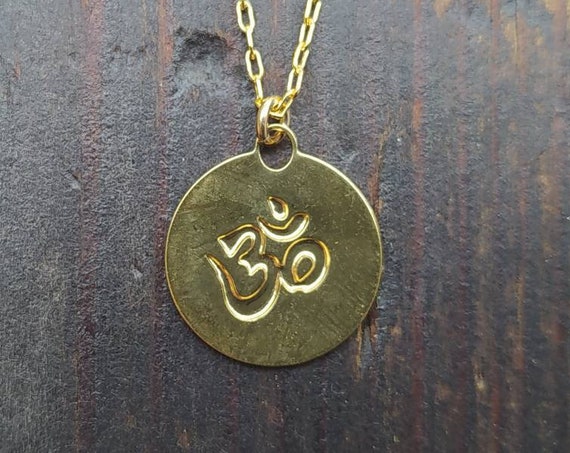 Gold Om Necklace. yoga gift ideas.