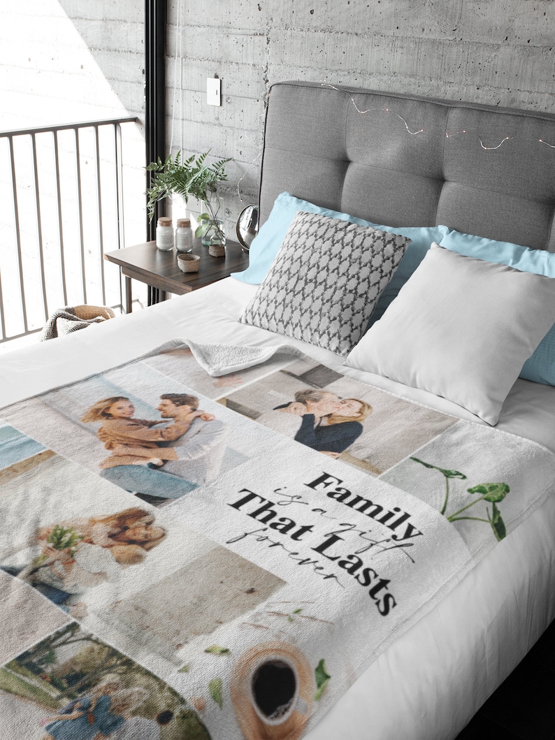 May include: A white fleece blanket with a collage of family photos and the text "Family is a gift that lasts forever".