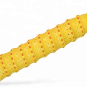 May include: Yellow and orange badminton racket grip with a textured surface and small holes.