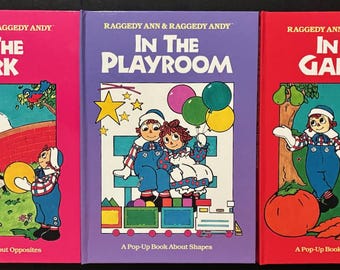 Raggedy Ann & Raggedy Andy Pop-Up Book Lot: At The Park About Opposites; In The Garden About Numbers; In The Playroom About Shapes 1st ed HC