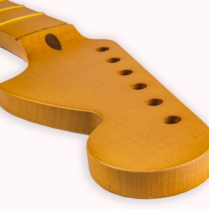 Strat-style CBS Neck made with quarter-sawn or flat-sawn rock maple, Vintage style  with Skunk Stripe. Fretworks done, Nitro coated.