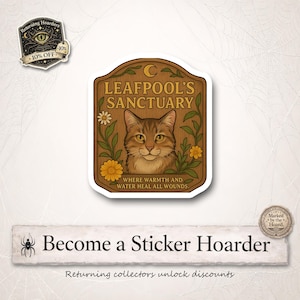 May include: A sticker with a brown wooden sign design featuring a cat illustration. The text reads "LEAFPOOL'S SANCTUARY" and "WHERE WARMTH AND WATER HEAL ALL WOUNDS." The sticker has a white border and is surrounded by floral elements.