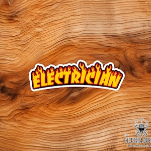 May include: A sticker with the word "ELECTRICIAN" in yellow, outlined in black, with flames above. The sticker is on a wooden surface. The bottom right corner has a logo with a spider and the text "ETCETERA DESIGNS BUCKSCOUNTY."