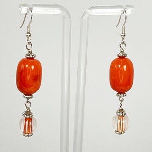 Earrings. Beautiful Orange Glass Earrings with Hand Blown dangling Beads. Silver Accents. You will enjoy wearing these earrings. image 1