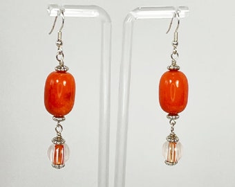 Earrings. Beautiful Orange Glass Earrings with Hand Blown dangling Beads. Silver Accents. You will enjoy wearing these earrings.