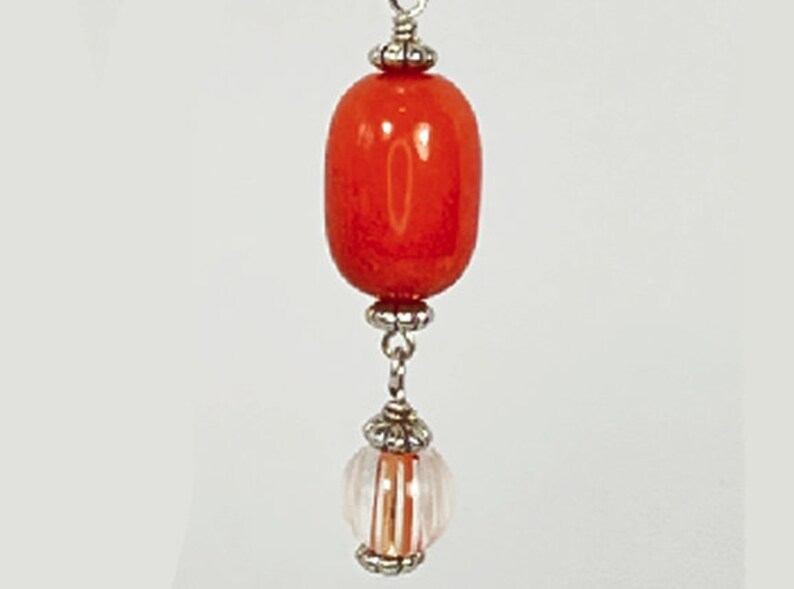 Earrings. Beautiful Orange Glass Earrings with Hand Blown dangling Beads. Silver Accents. You will enjoy wearing these earrings. image 2