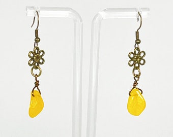 Earrings. Beautiful Yellow Glass Drops with Brass Flower Accents. Dangle earrings. You will enjoy wearing these earrings.