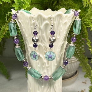 Beaded necklace and earrings. Cut Glass beads. Amethyst beads.  Silver beads.