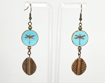 Earrings. Beautiful Dragonfly Earrings. Turquoise earrings. Brass accents. Dangle earrings. You will enjoy wearing these earrings.