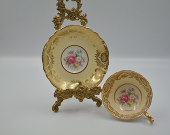 Paragon Double Warrant Yellow Teacup with Heavy Gold Detailing and Rose Floral Bouquet