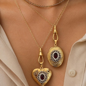 Antique gold tone Garnet lockets