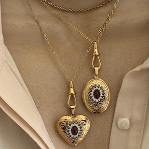 Antique gold tone Garnet lockets