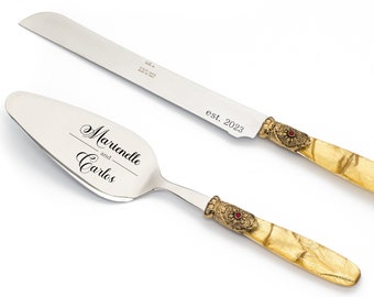 Engraved Wedding Cake Knife & Server Set with Gold Fabric Effect Handle and Antique Gold Washed Metal Ring with a Red Stone Decoration