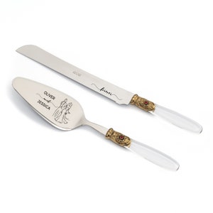 Wedding Cake Server and Knife Cutting Set with Transparent Handle Antique Gold Washed Metal Ring with a Red Stone Decoration