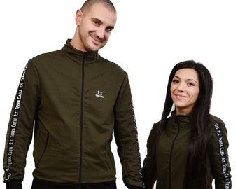 men and women matching tracksuits