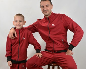 father and son matching nike tracksuits