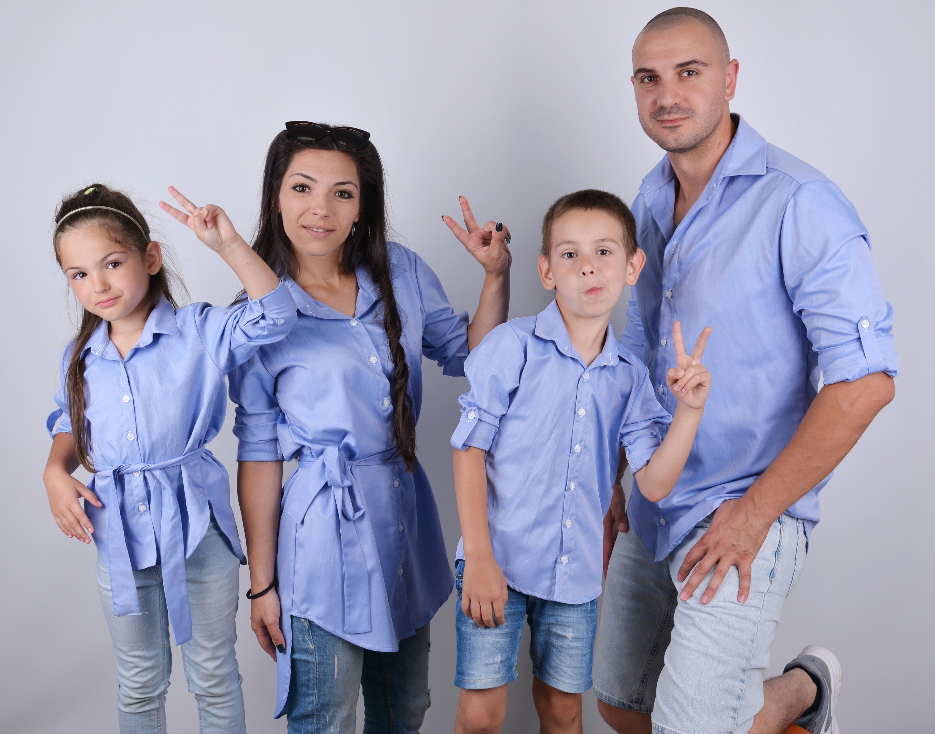 mother father and son matching outfits