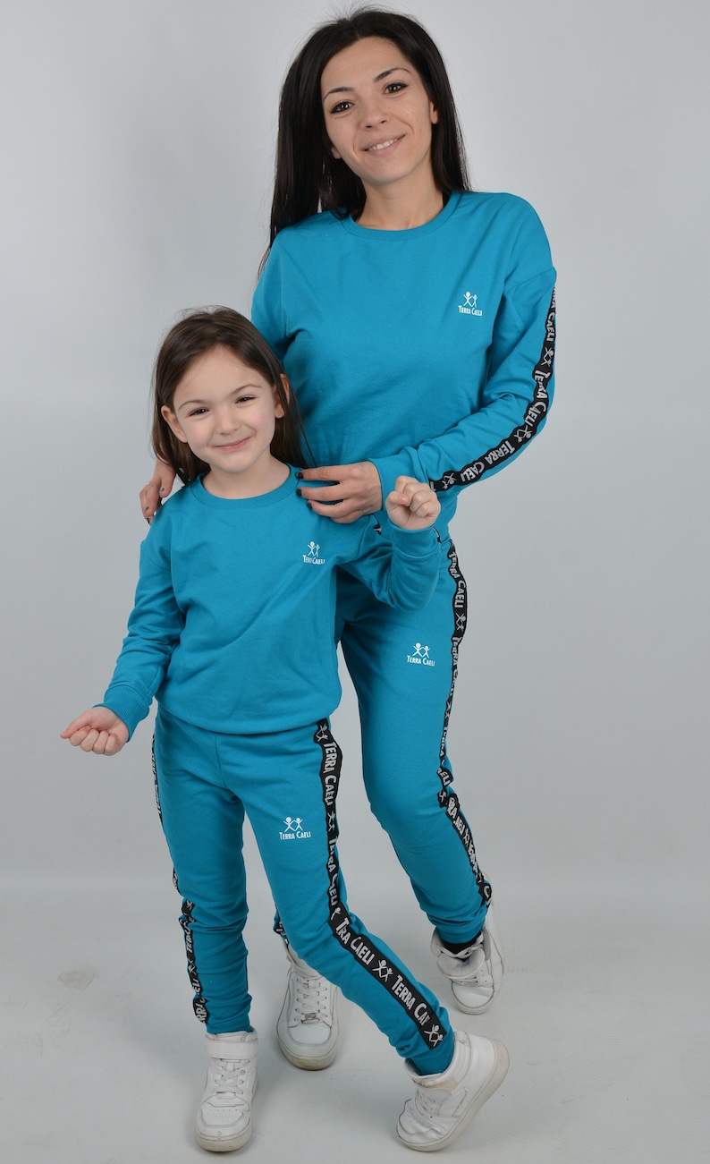 Спортивные костюмы для всей семьи