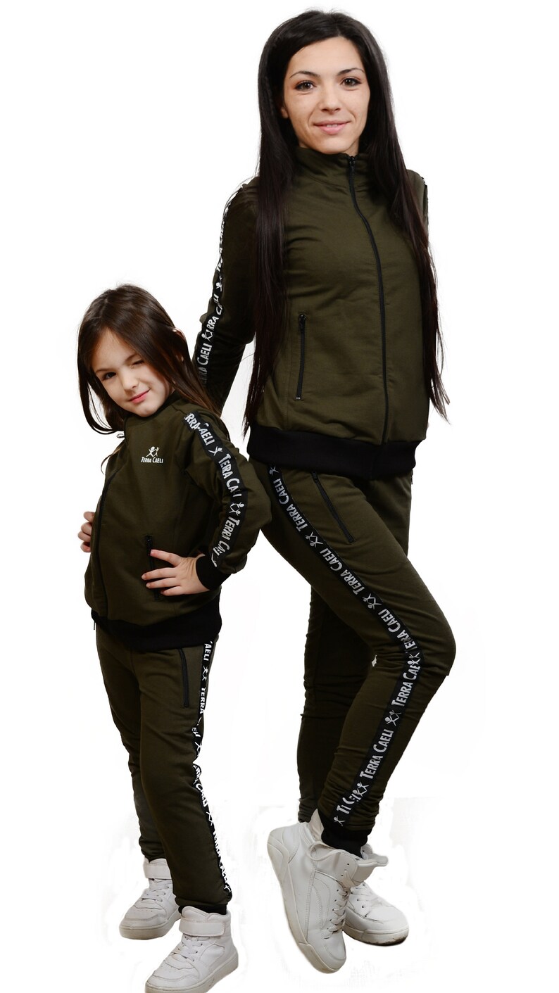 men and women matching sweatsuits
