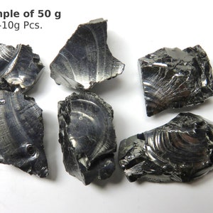 K&ouml;nnte beinhalten: Beispiel f&uuml;r 50 Gramm schwarzer, metallischer, unregelm&auml;&szlig;ig geformter St&uuml;cke aus rohem, unpoliertem Metall. Die St&uuml;cke sind jeweils 5-10 Gramm schwer.