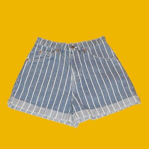 May include: Blue denim shorts with white vertical stripes and a cuffed hem.