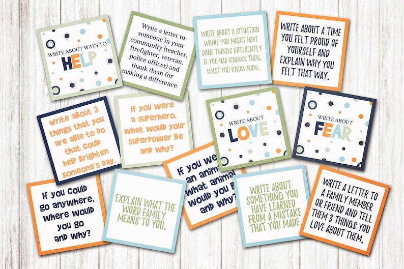 May include: A set of 10 colorful cards with writing prompts for journaling. The cards have a blue, green, and orange color scheme with white polka dots. The cards have prompts such as "Write about ways to help", "Write about love", and "Write about fear".
