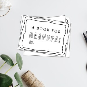 May include: A stack of blank white pages with a black border and the text "A Book for Grandpa! By--" on the top page.