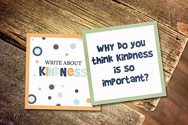 May include: Two cards with a white background and colorful polka dots. The first card says "Write About Kindness" in blue, orange, and yellow letters. The second card says "Why do you think Kindness is so important?" in blue letters.