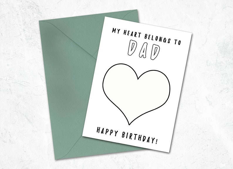 May include: A blank white card with a black outline of a heart and the text "MY HEART BELONGS TO DAD" and "HAPPY BIRTHDAY!"