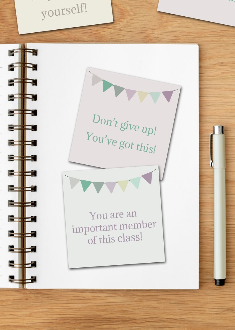 May include: Two motivational notes with a pastel color scheme and a string of flags at the top. The first note says "Don't give up! You've got this!" The second note says "You are an important member of this class!"