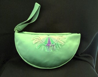 Pochette elegante in pura seta.