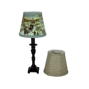 Black Accent Lamp with a Christmas Lithograph and a Gray Clip-On Lamp Shade