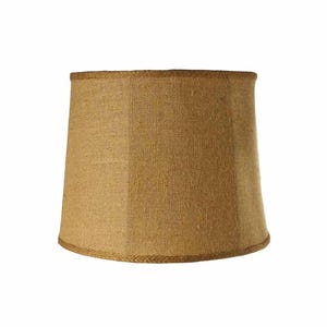 May include: A brown burlap lampshade with a rope trim.