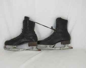 A Pair Black Vintage Ice Skates