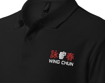 May include: Black polo shirt with a red embroidered Wing Chun logo featuring the Chinese characters for Wing Chun and a white fist.