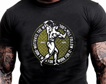 May include: Black t-shirt with a yellow circle graphic featuring a muscular figure lifting weights. The text around the figure reads "Don't Win For A Day, Work For It - Today Will Follow The Motivation".