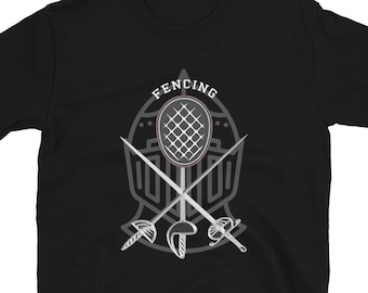 May include: Black t-shirt featuring a fencing design. The design includes crossed swords, a fencing mask, and the word "FENCING" in a white, stylized font. The graphic is in shades of gray and white.