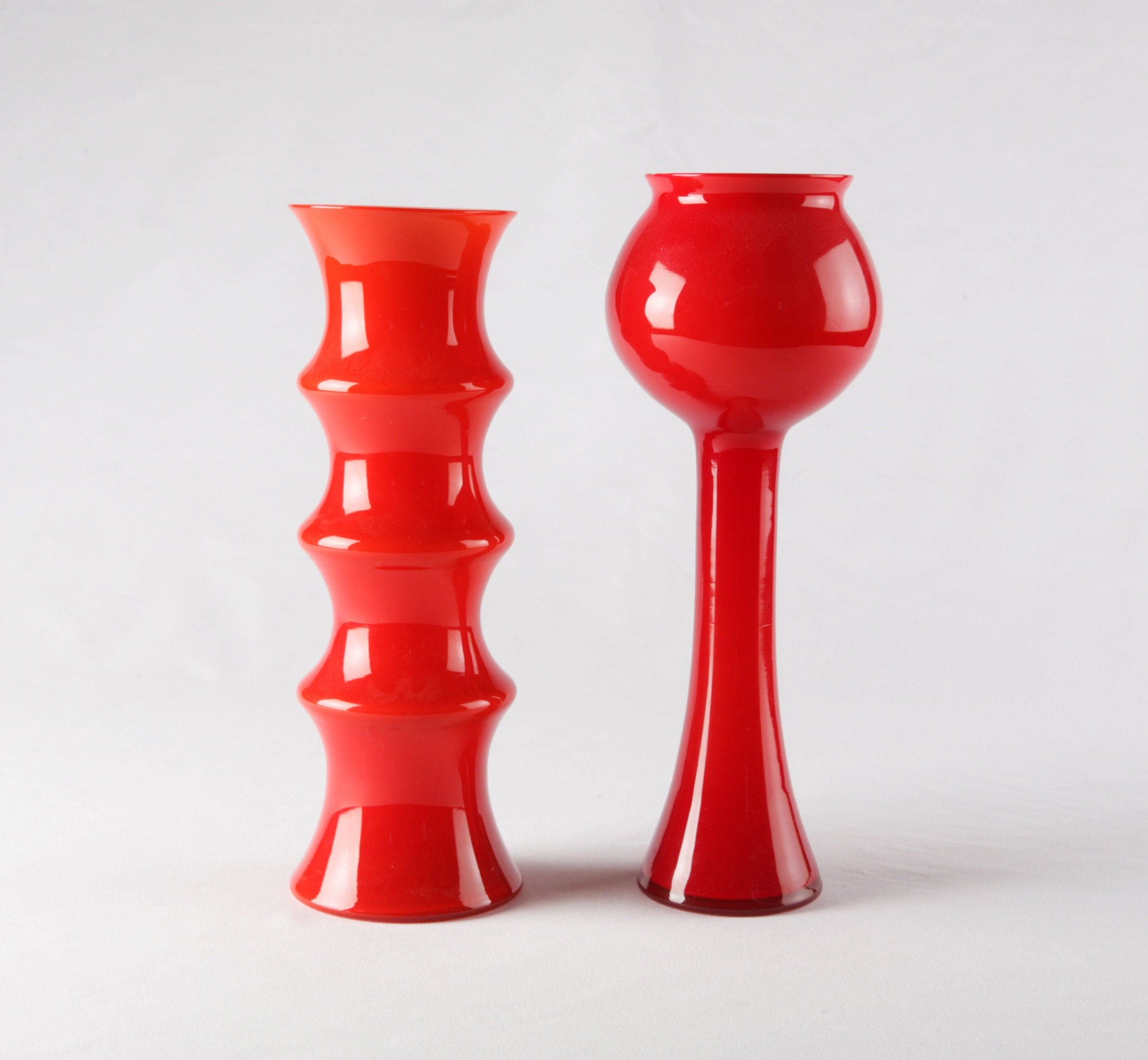 Two Swedish Red and White cased glass vases from the 60’s. Mouthblown pop vases. Scandinavian design