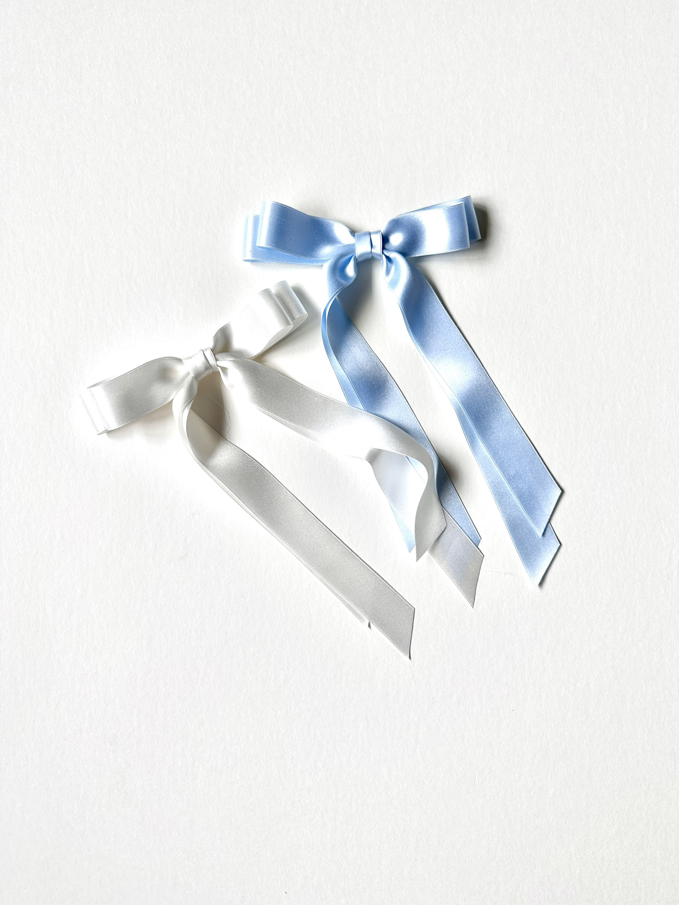 Bow, made of blue silk ribbon Stock Photo by ©Valentyn_Volkov 3649136