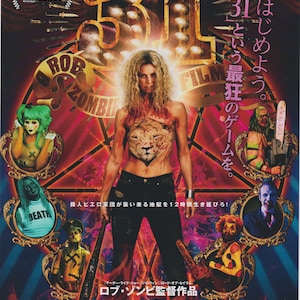May include: A movie poster for the horror film 31, directed by Rob Zombie. The poster features a woman with bloody makeup and a lion-print top, surrounded by other characters in a dark and bloody setting. The text on the poster reads "31" and "Rob Zombie Film".