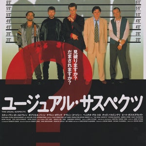 May include: A movie poster for the film "The Usual Suspects" featuring a red question mark with the text "見破りますか? だまされますか?" in Japanese. The poster also features five men standing in a lineup with a height chart behind them. The men are wearing various clothing, including a brown leather jacket, a blue shirt, a tan suit, and a vest.