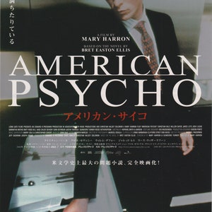 May include: Movie poster for the film "American Psycho" featuring Christian Bale, Willem Dafoe, and Jared Leto. The poster has a black background with white text and a red and white title card. The text on the poster reads "American Psycho" and "A Film by Mary Harron".