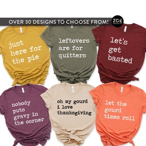 May include: A set of ten Thanksgiving-themed t-shirts with various sayings, including "Just here for the pie", "Leftovers are for quitters", "Let's get basted", "Nobody puts gravy in the corner", "Oh my gourd I love Thanksgiving", and "Let the gourd times roll".