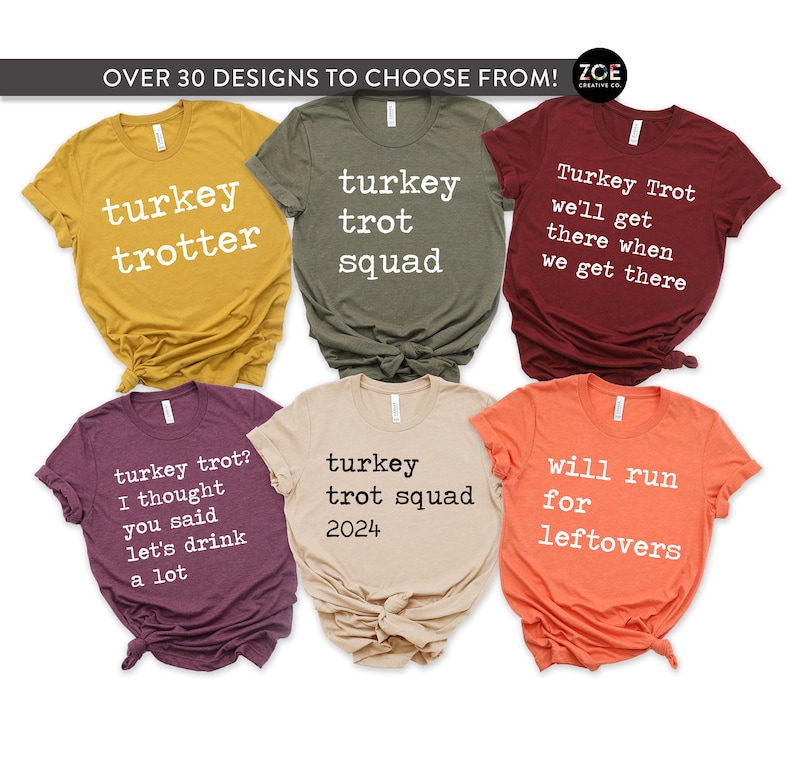 May include: Ten different t-shirt designs featuring Thanksgiving-themed text in a typewriter font. The shirts are in various colors, including mustard yellow, olive green, maroon, burgundy, beige, and orange.