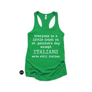 May include: A green racerback tank top with white text that reads "everyone is a little irish on st. patrick's day except ITALIANS we're still italian". The tank top has a scoop neck and a racerback design.